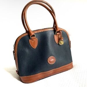 Dooney & Bourke Black and Brown Leather Domed Purse